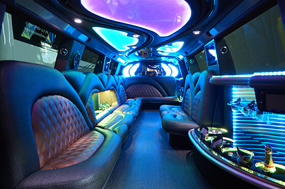 Hummer limo service with custom leather seating